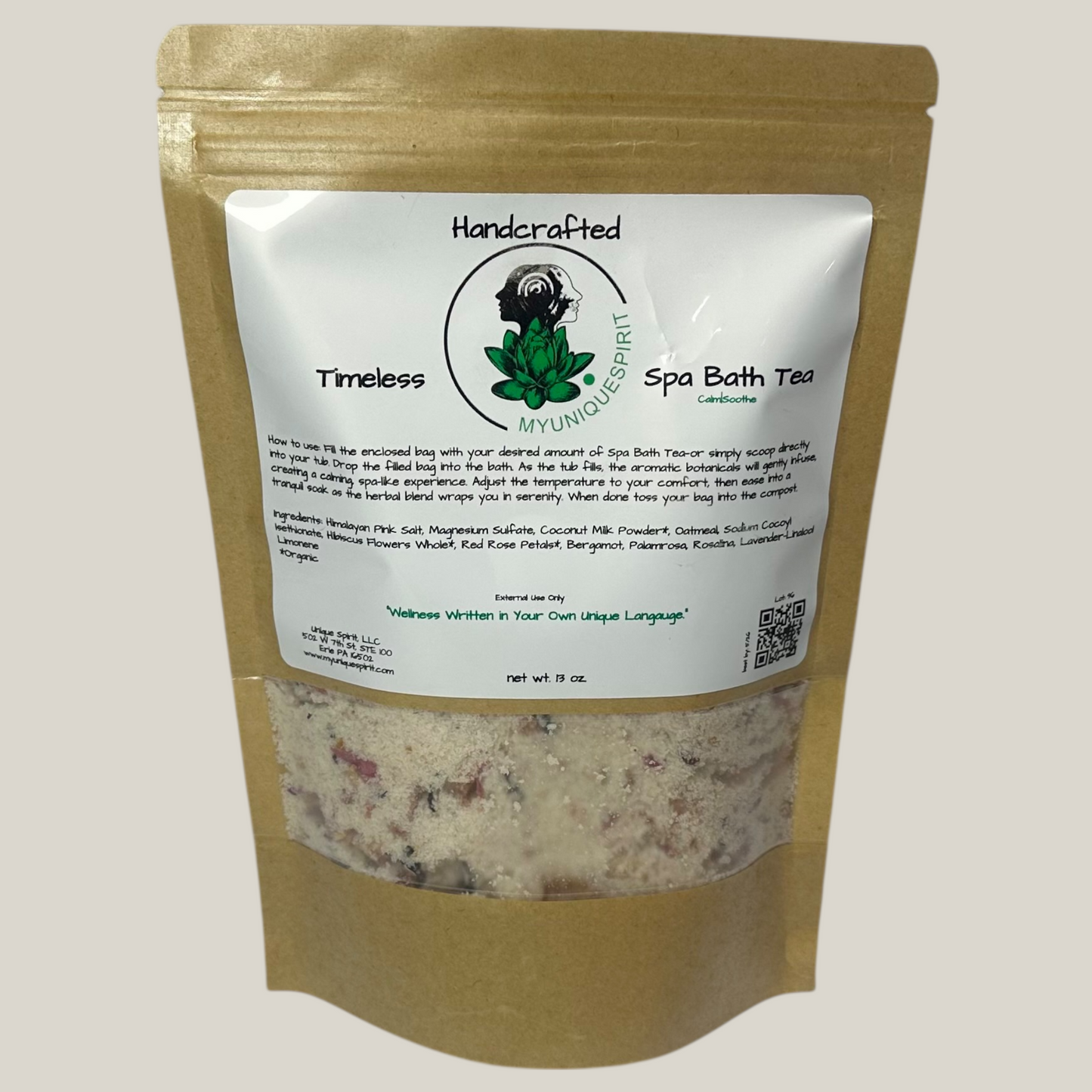 Handcrafted Spa Bath Tea package with a gold exterior and white label on a light gray background