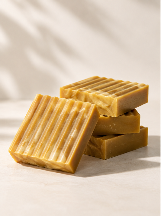 Ancient Silk Road handcrafted soap bars by MyUniqueSpirit, featuring golden-brown coloring and textured ridges, arranged on a soft cream background.