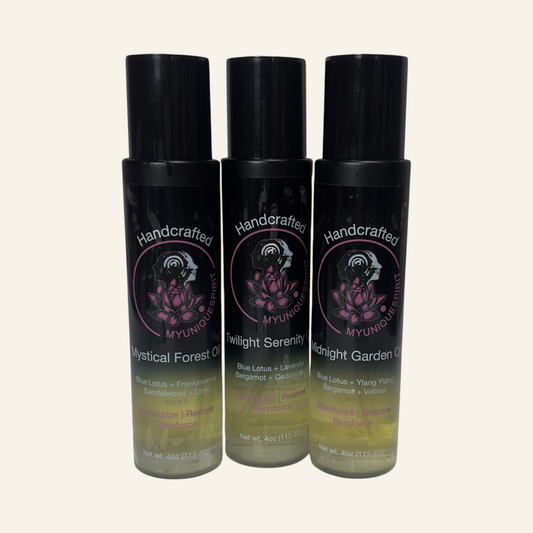 Three bottles of 'Handcrafted Mystical' products on a white background