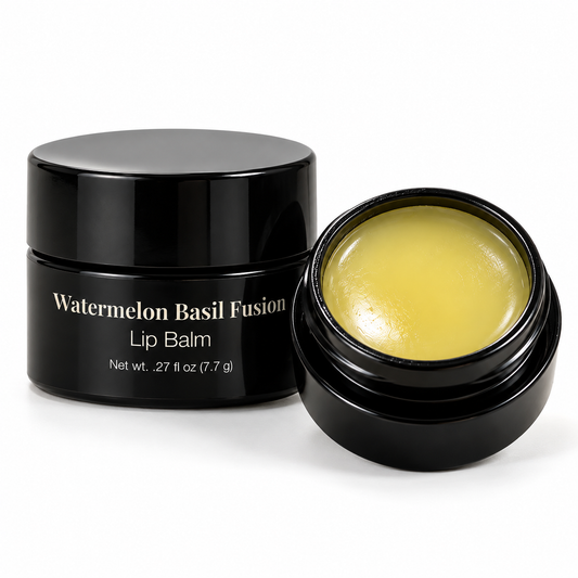 Black jar of MyUniqueSpirit Watermelon Basil Fusion Lip Balm beside an open jar showing the pale yellow balm on a clean white background.