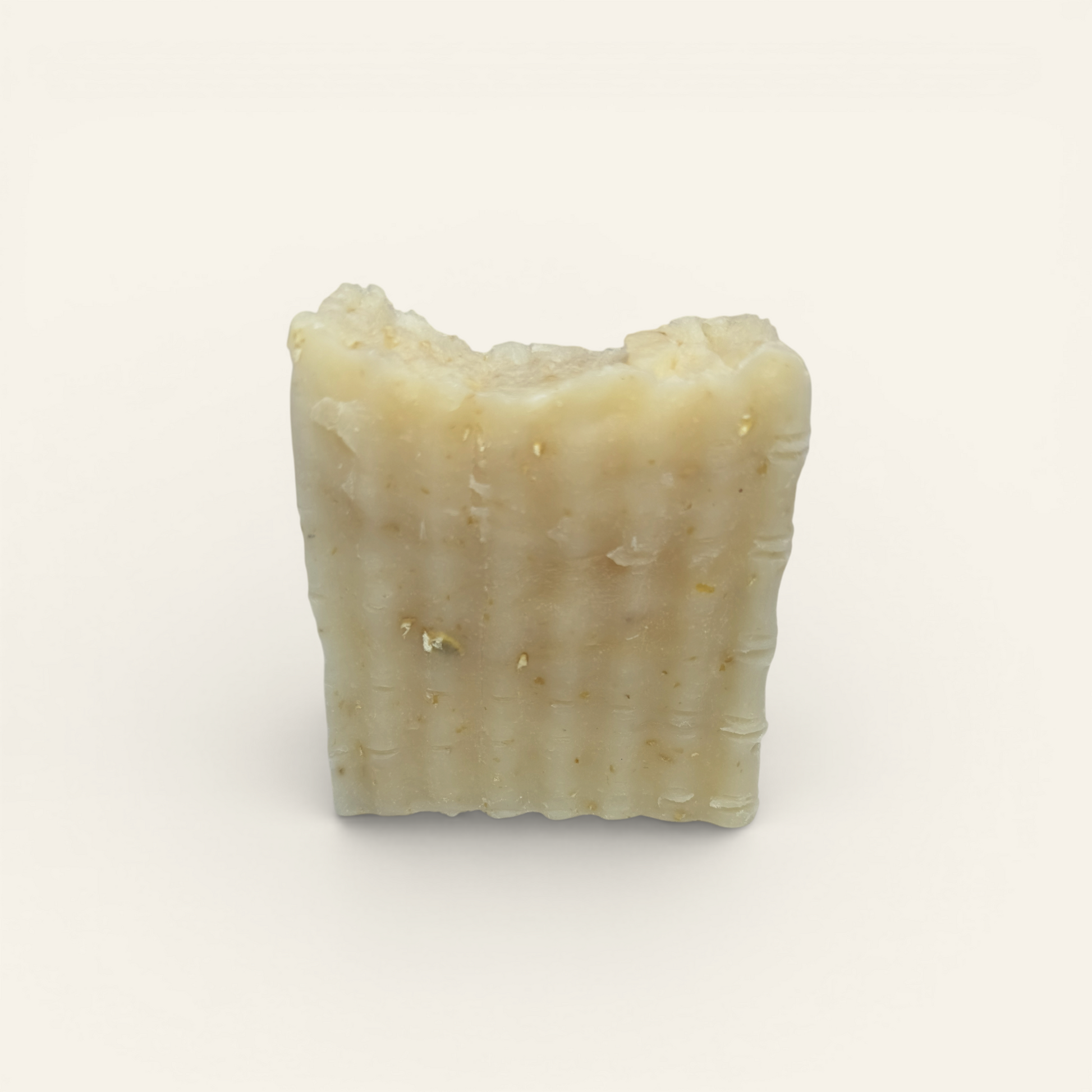 Oat Cleansing Bar on a beige background 