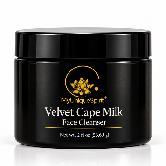 MyUniqueSpirit Velvet Cape Milk Face Cleanser in a black 2 fl oz jar with gold lotus branding, displayed on a clean white background with a subtle reflection.